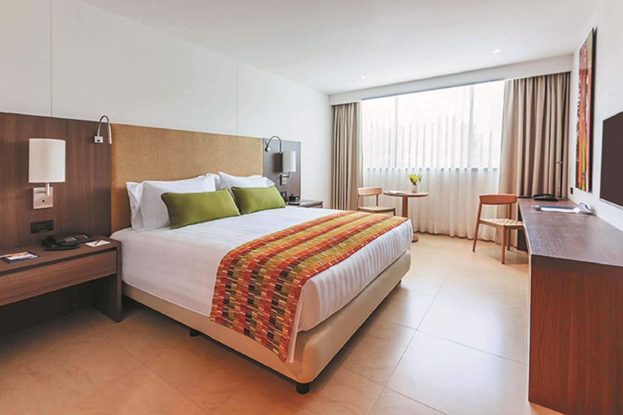 Estelar Villavicencio Hotel & Centro De Convenciones Kültér fotó A room at the hotel