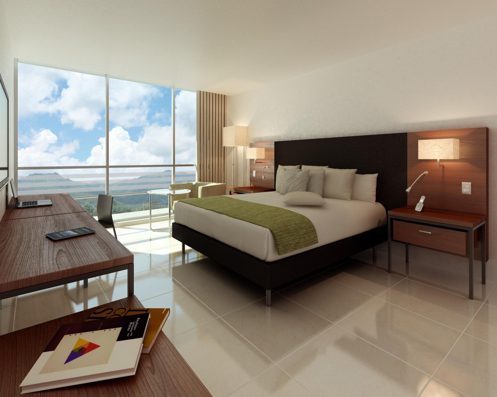 Estelar Villavicencio Hotel & Centro De Convenciones Kültér fotó A bedroom in the hotel