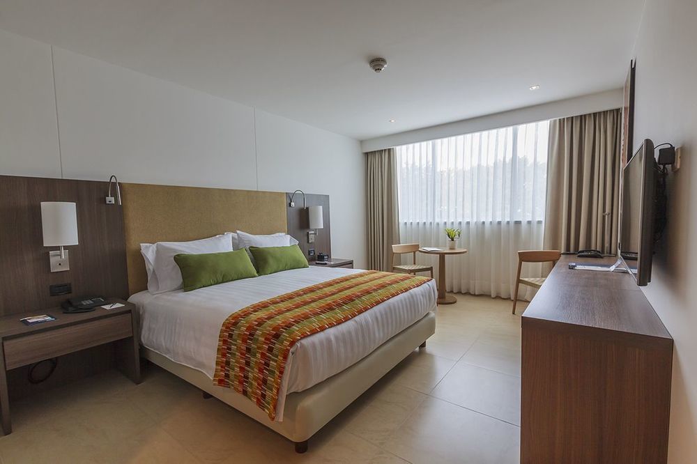 Estelar Villavicencio Hotel & Centro De Convenciones Kültér fotó A room at the hotel